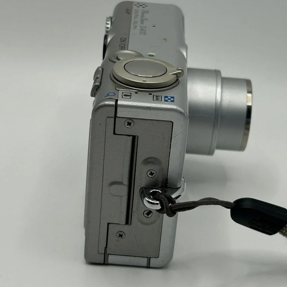 Canon PowerShot S410 Digital ELPH 4MP Camera w/original box for Parts/Repair